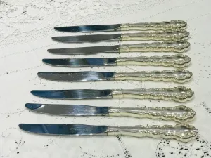 8 Silver Plated Starter  Knives 8 1/2”