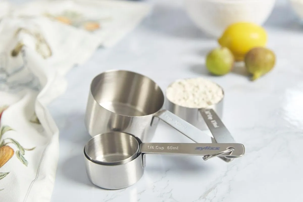 Zyliss Premium Stainless Steel Measuring Cups - Stainless Steel Measuring Cup Set - Dry Ingredient Nesting Measuring Cups - Premium Bakeware & Kitchen Tools - 4 Piece